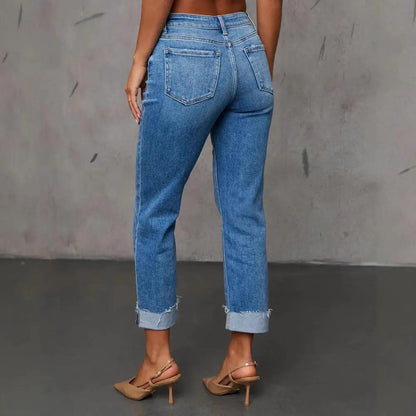 Cuffed blue denim Capri jeans, stretchy back view with rolled cuffs on Tampa Home & Garden Store