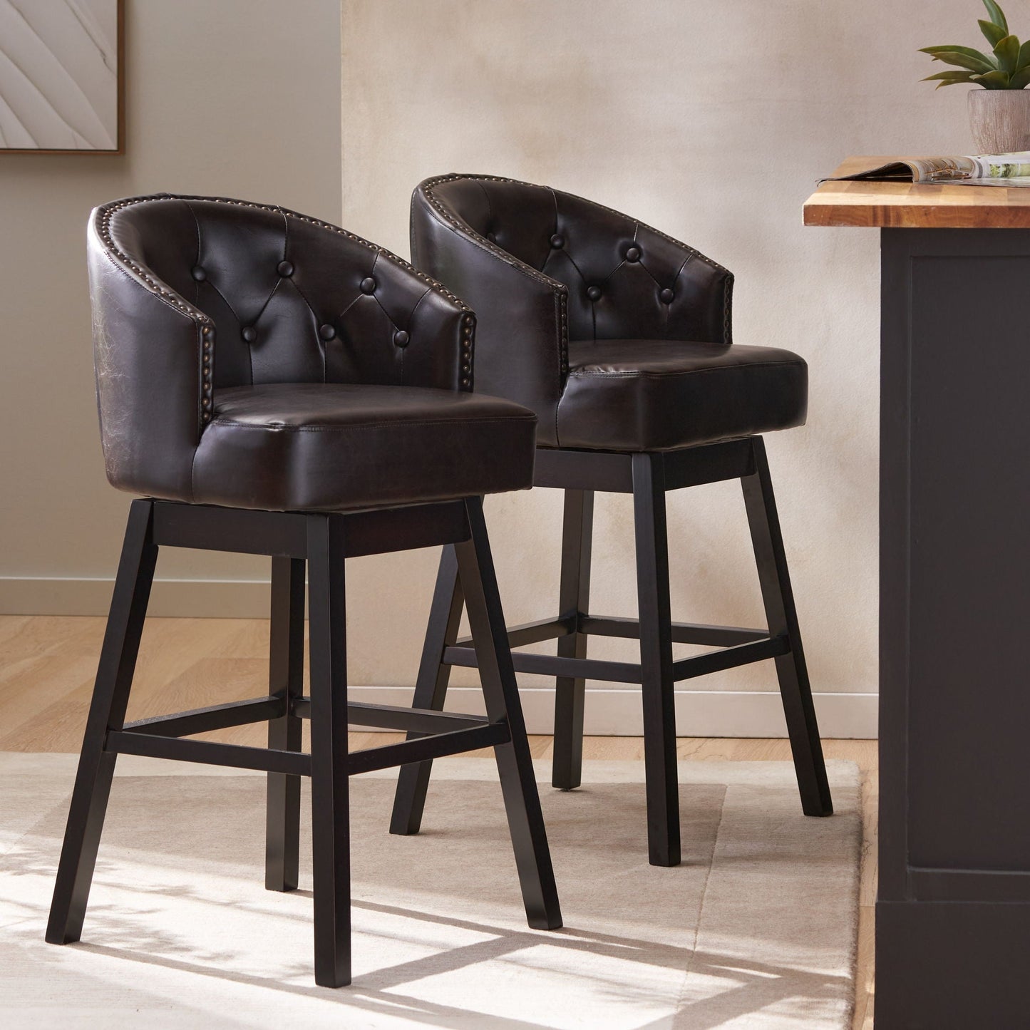 360 Degree Swivel Bar Stool Set of 2 in black leather with nailhead trim and tufted back on Tampa Home & Garden Store