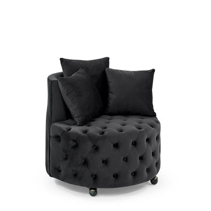 Modern upholstered swivel chair in black velvet with button tufting and rolling casters on Tampa Home & Garden Store
