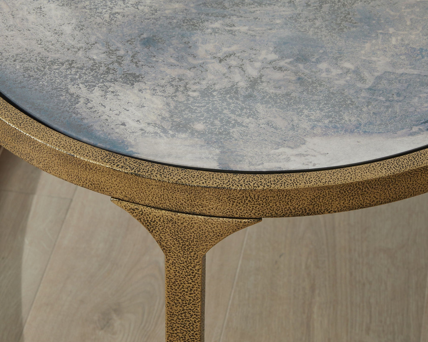 Korajane coffee table with blue marbled top and textured gold speckled frame on Tampa Home & Garden Store