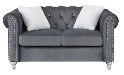 HouseOfZazla jeweled tufted gray velvet loveseat with studded arms and white pillows on Tampa Home & Garden Store