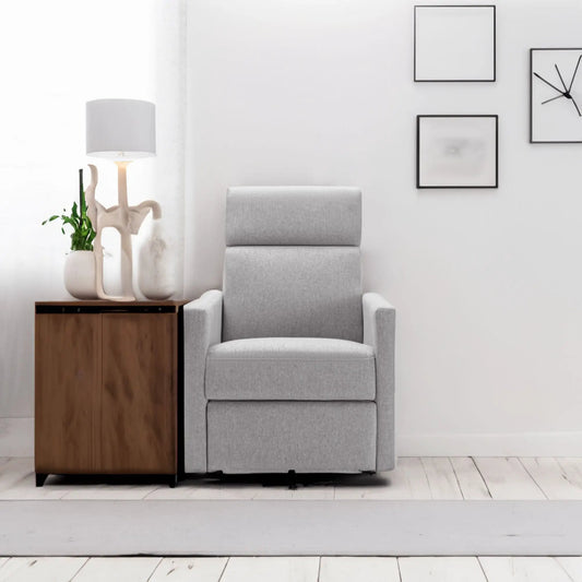 Modern gray upholstered nursery rocking chair in a room with a wood cabinet and wall art on Tampa Home & Garden Store
