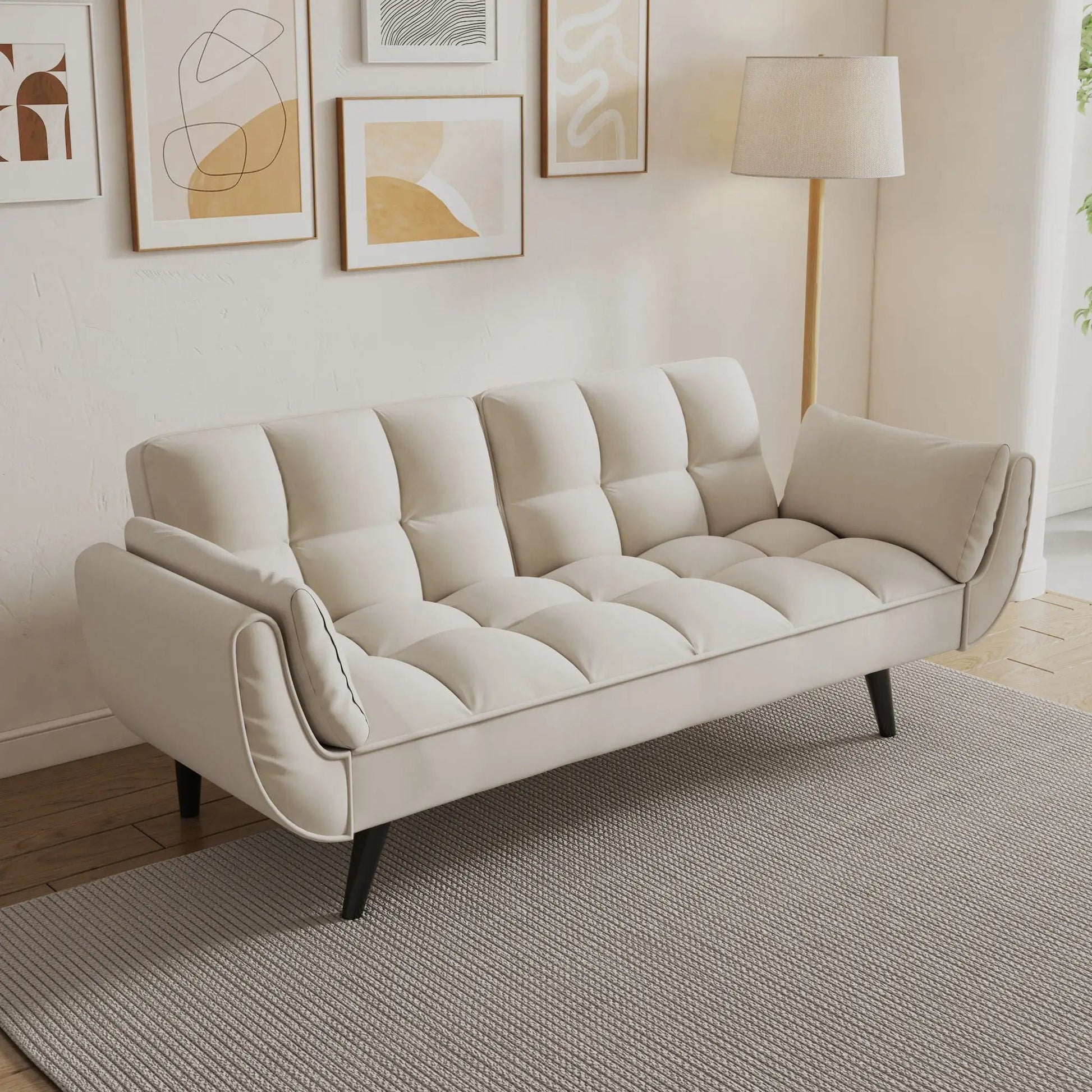 Two-armrest cream futon sofa with tufted cushions on Tampa Home & Garden Store