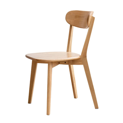 Simple dining chair in natural oak with rounded seat and curved back by Unique Piece Furniture on Tampa Home & Garden Store