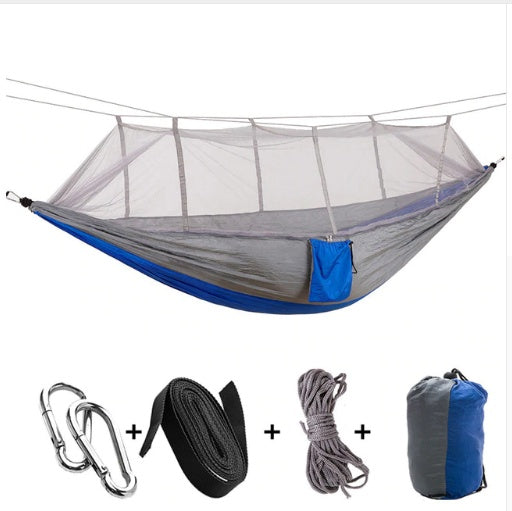 Parachute hammock with mosquito net in army green; includes carabiners, straps, rope, bag on Tampa Home & Garden Store