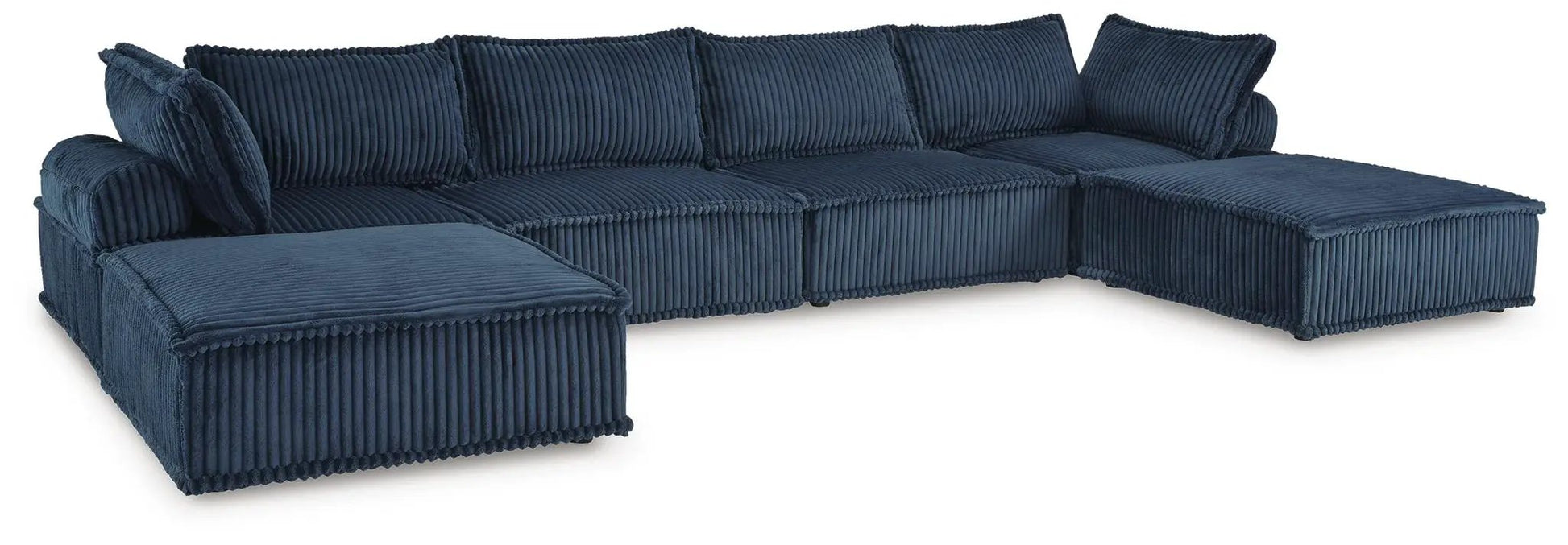 Bales sectional sofa in navy blue corduroy with ribbed upholstery and plush back cushions on Tampa Home & Garden Store