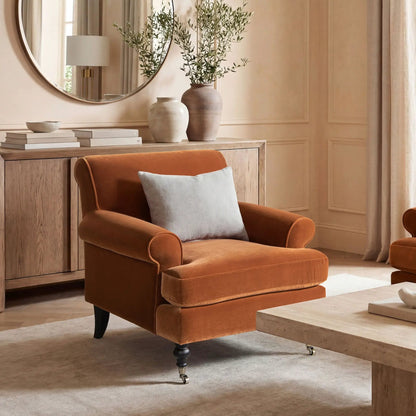 Alana Lawson accent arm chair in burnt orange velvet with caster feet Unique Piece Furniture on Tampa Home & Garden Store
