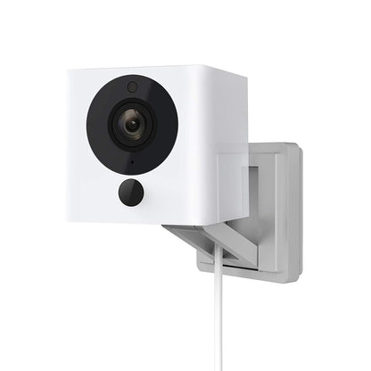 Wireless smart home camera by Sell My Stuff, white body with black lens on wall mount on Tampa Home & Garden Store