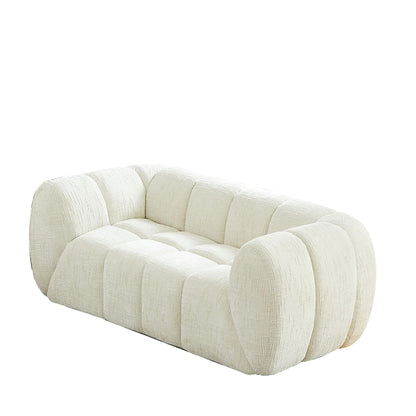 Rounded Cloud Sofa and Piano Key Backrest Design