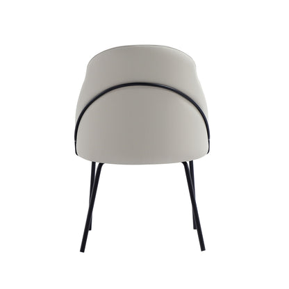 Modern vegan upholstered dining chair beige with black piping and metal legs on Tampa Home & Garden Store