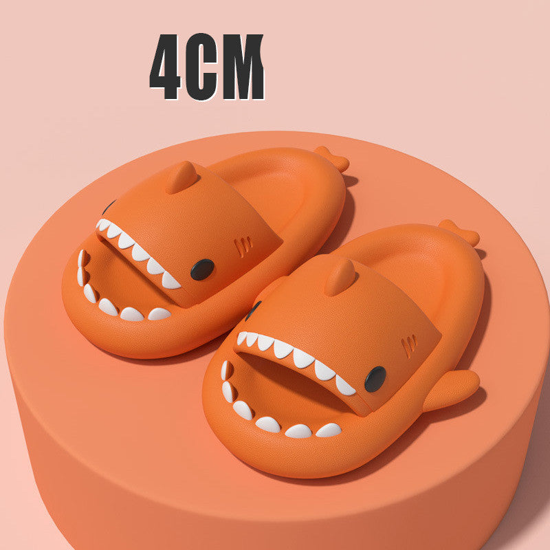 Orange Stevvex shark-shaped slides, pair of open-toe beach sandals with toothy mouths on Tampa Home & Garden Store