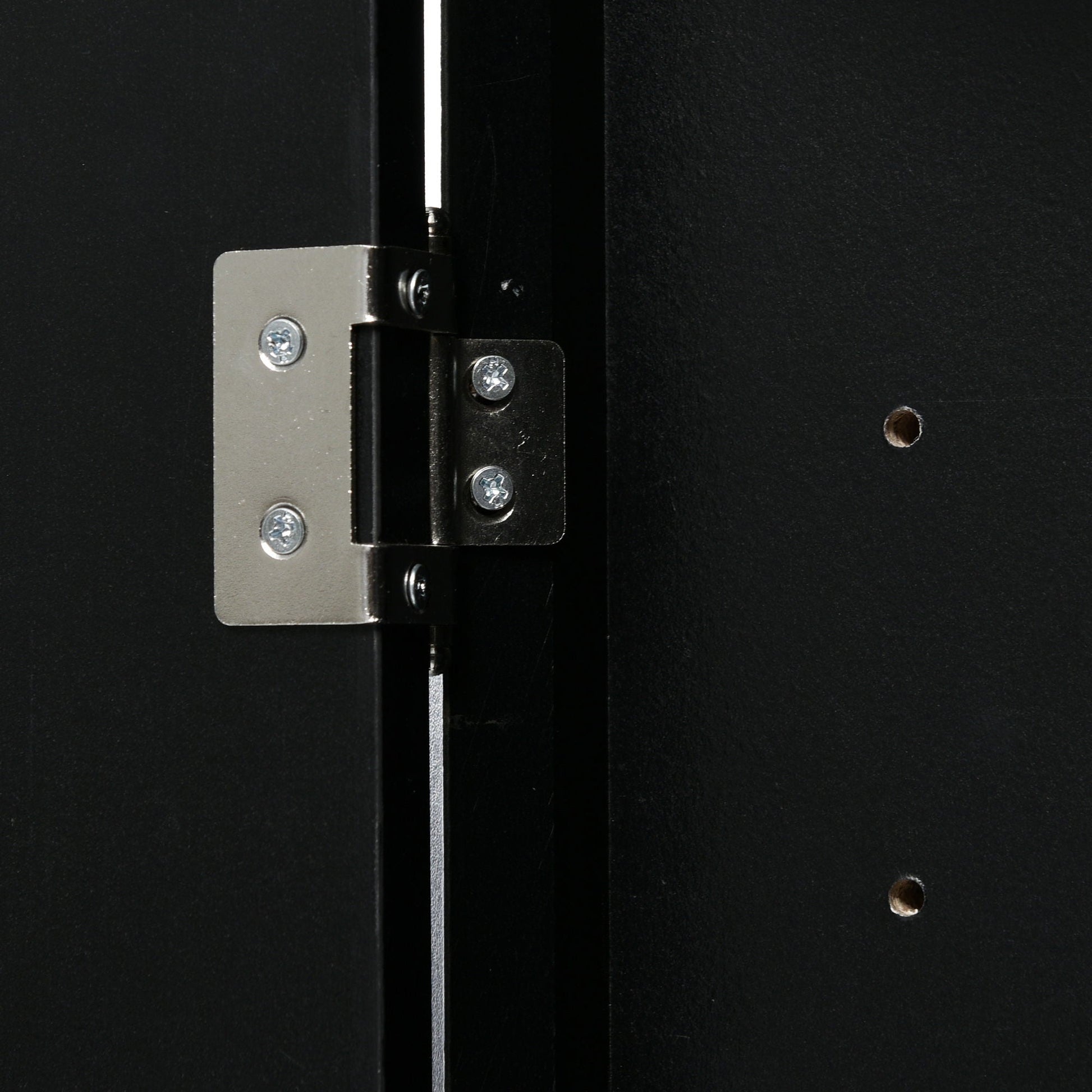Triangle bathroom storage cabinet hinge close-up on black linen cabinet by HouseOfZazla on Tampa Home & Garden Store