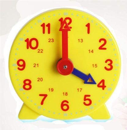 Stevvex yellow 4in learning clock with red hour and blue minute hands, plastic classroom on Tampa Home & Garden Store