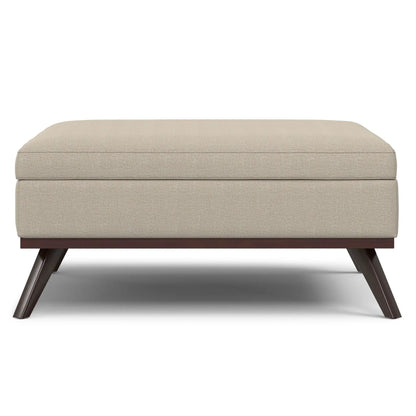 Owen multifunctional square coffee table storage ottoman beige fabric with dark wood legs on Tampa Home & Garden Store