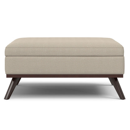 Square lift-top storage ottoman by HouseOfZazla, beige fabric with dark wood legs on Tampa Home & Garden Store