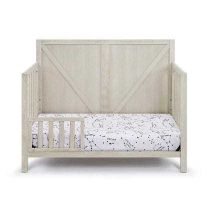 Barnside 4-in-1 Convertible Crib in light graywashed wood with diagonal X-brace panels on Tampa Home & Garden Store