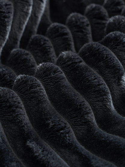 Sectional sofa close-up in black plush velvet fabric by HouseOfZazla on Tampa Home & Garden Store