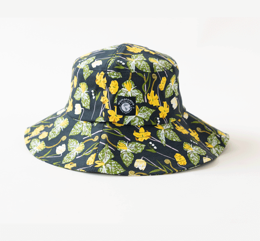 Cotton bucket sun hat in Woodland Garden navy with yellow florals by Womanswork on Tampa Home & Garden Store