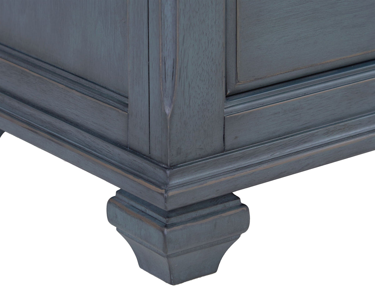 Blue accent chest by HouseOfZazla with distressed finish and paneled legs on Tampa Home & Garden Store