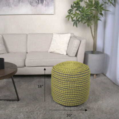 River cylindrical pouf, yellow and black striped fabric, water-resistant accent piece on Tampa Home & Garden Store