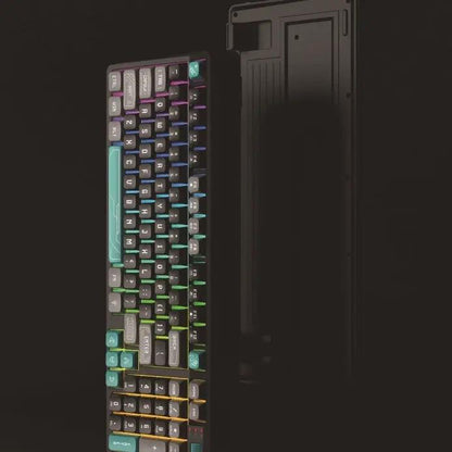 Three-color luminous keyboard with RGB keys beside a dark PC case on Tampa Home & Garden Store