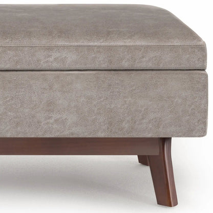 Owen Upholstered Rectangular Storage Ottoman in taupe fabric with brown wooden legs on Tampa Home & Garden Store