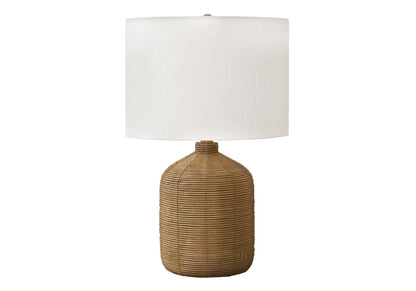 Table lamp with rattan base and white fabric shade on Tampa Home & Garden Store