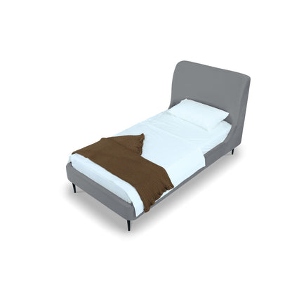 Twin Bed with Curved Velvet and Gray Headboard