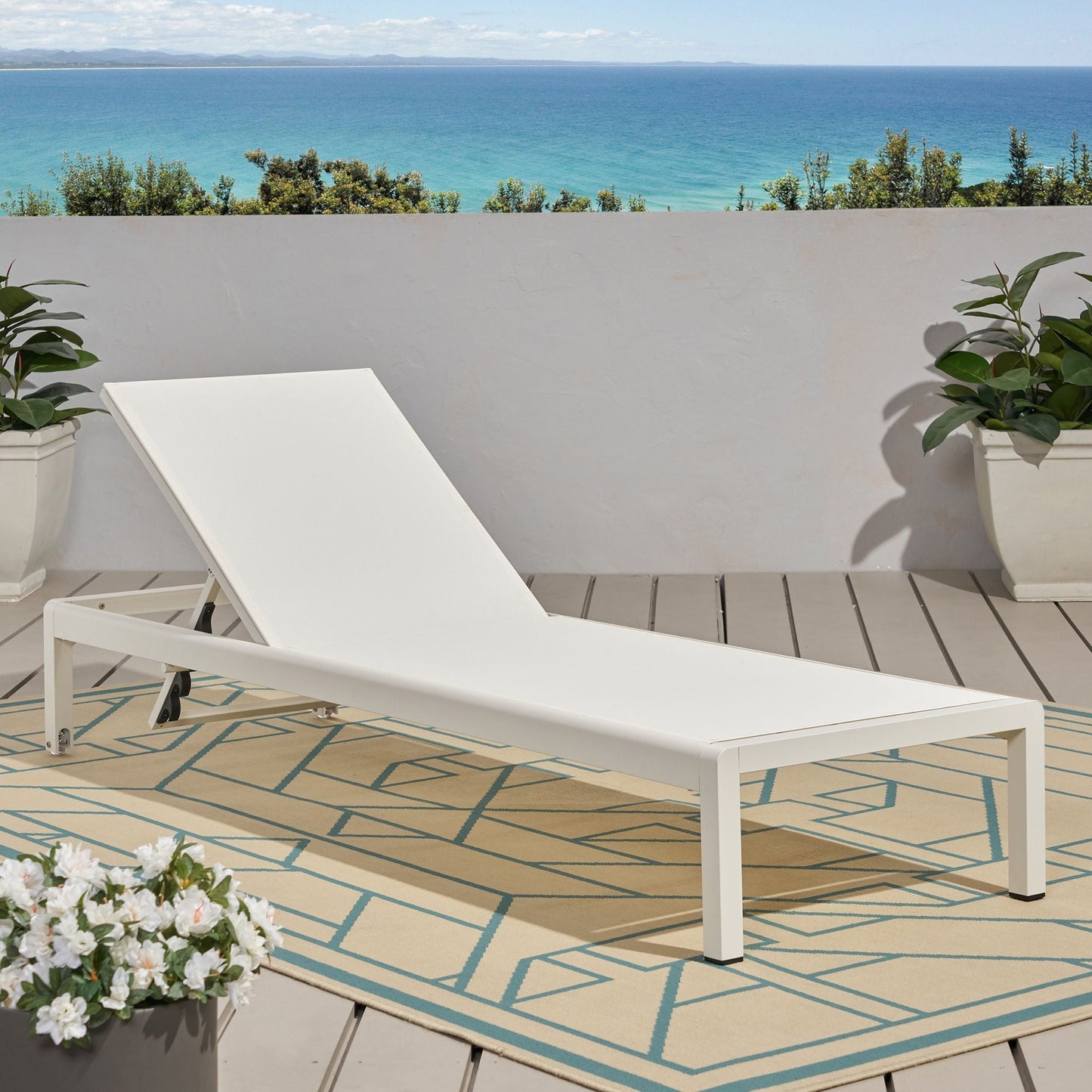 Outdoor chaise lounge by HouseOfZazla, white frame with 5 reclining positions on a deck on Tampa Home & Garden Store