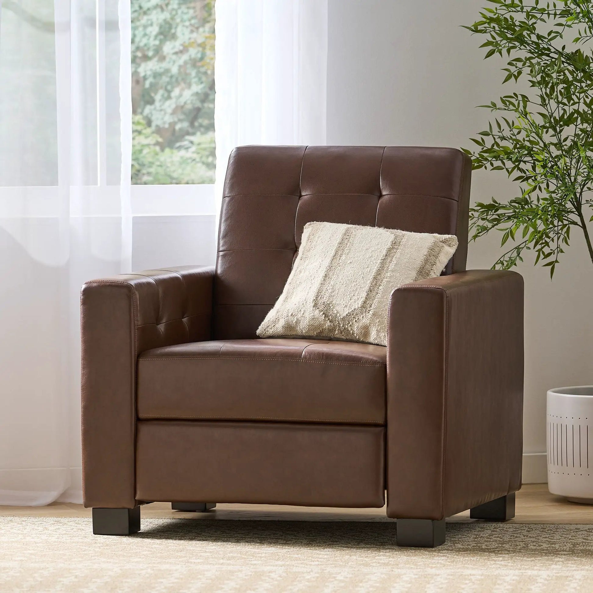 Langseth Contemporary Tufted Pushback Recliner, brown leather, tufted back in living room on Tampa Home & Garden Store