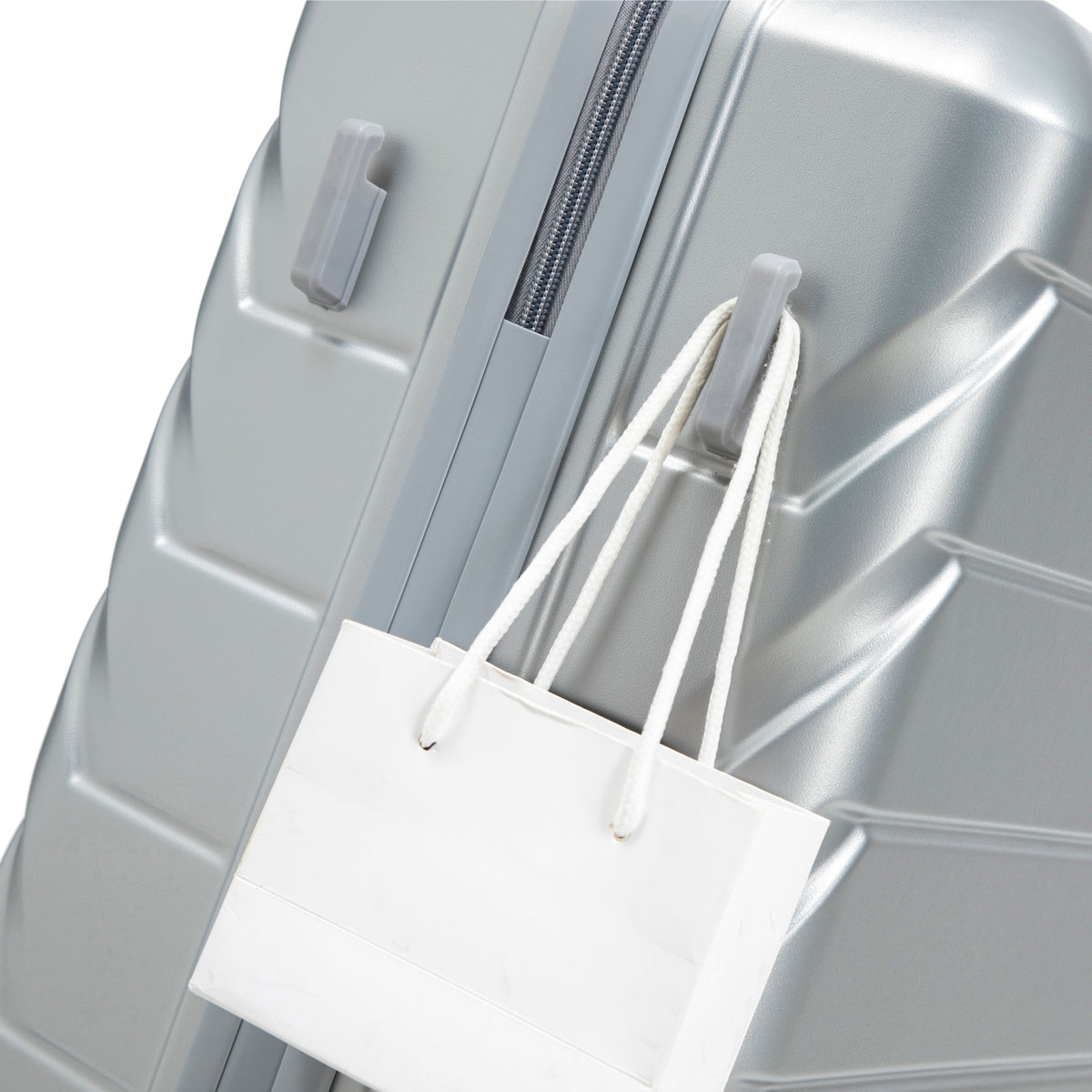 3-Piece ABS Spinner Wheel Luggage Set with Combination Lock in silver; zipper and bag visible on Tampa Home & Garden Store