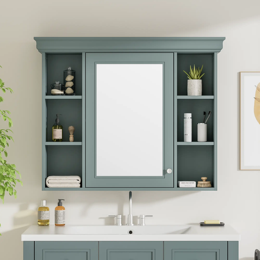 Blue wall mounted medicine cabinet with mirror and side shelves holding bottles and a plant on Tampa Home & Garden Store