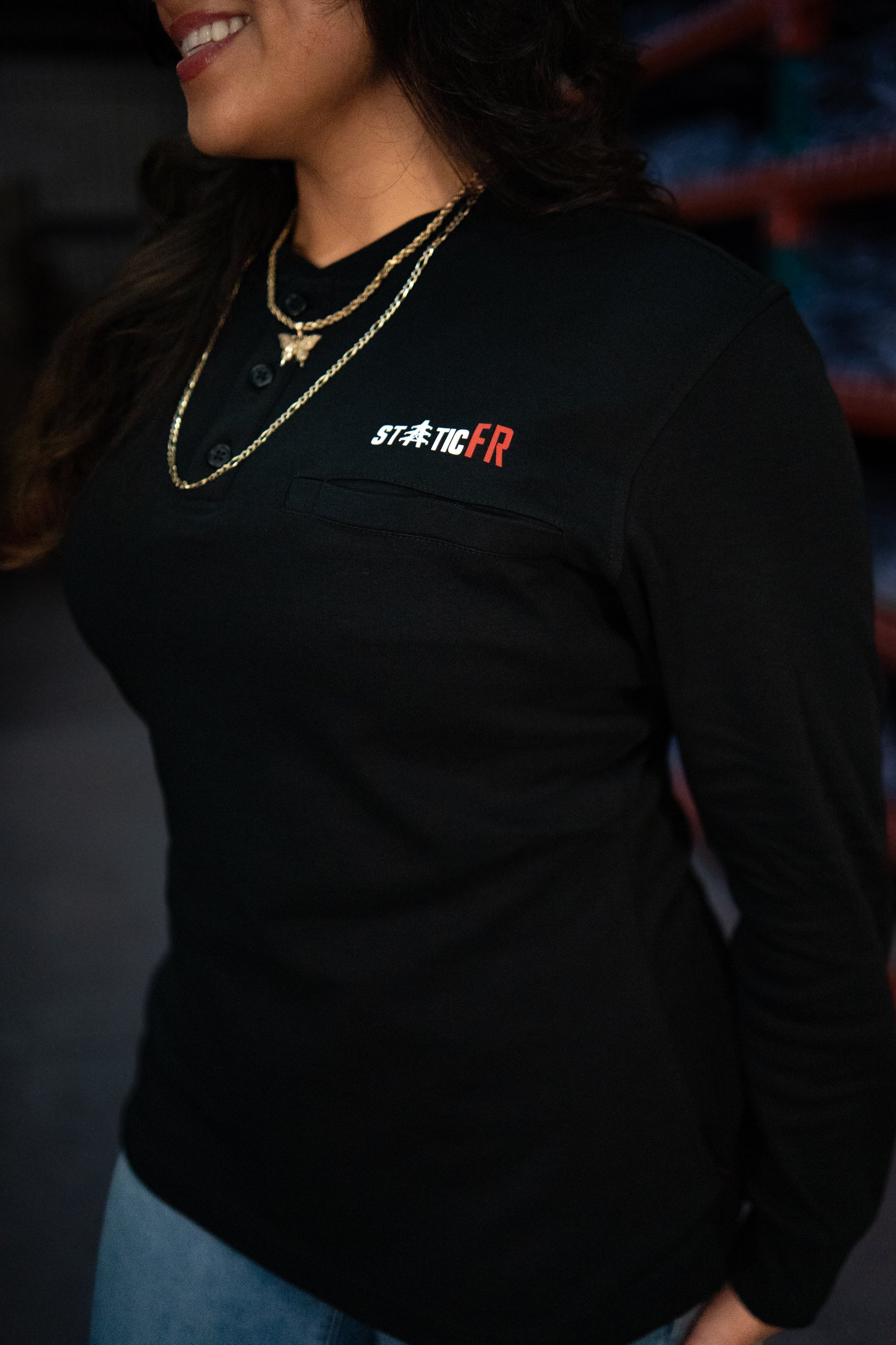 Women's FR 3-Button Henley black top with Static FR logo for work safety gear on Tampa Home & Garden Store
