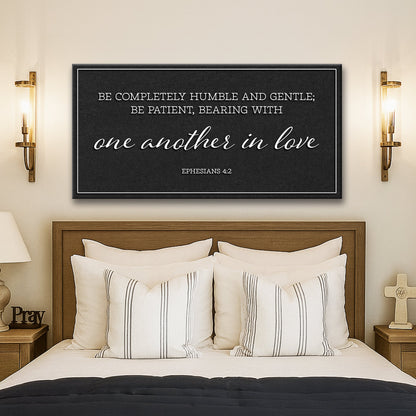 Be Completely Humble And Gentle Ephesians 4:2 Faith Sign II canvas with white text on black between gold sconces on Tampa Home & Garden Store