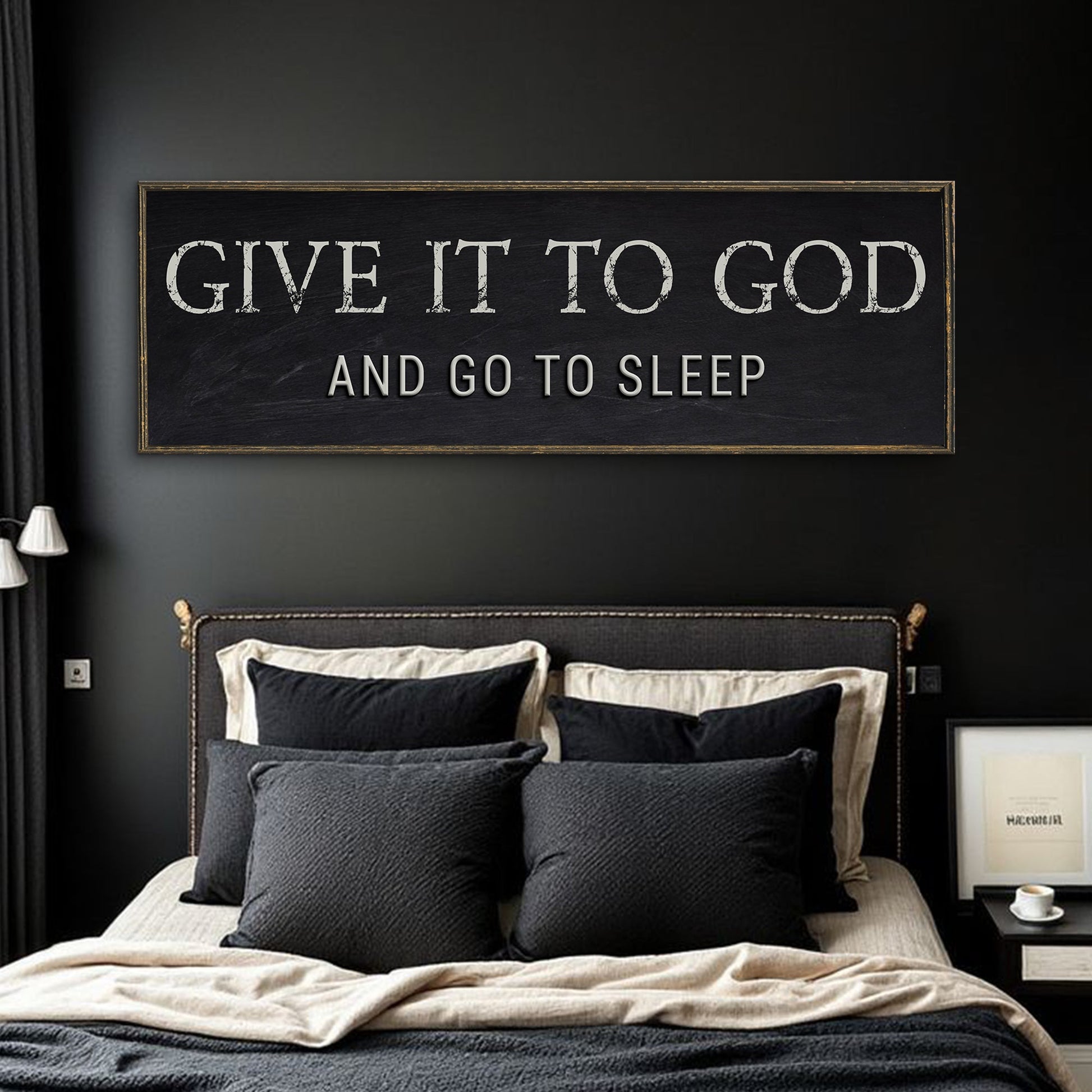 Canvas bedroom sign Give It To God And Go To Sleep with white lettering on black wood frame on Tampa Home & Garden Store