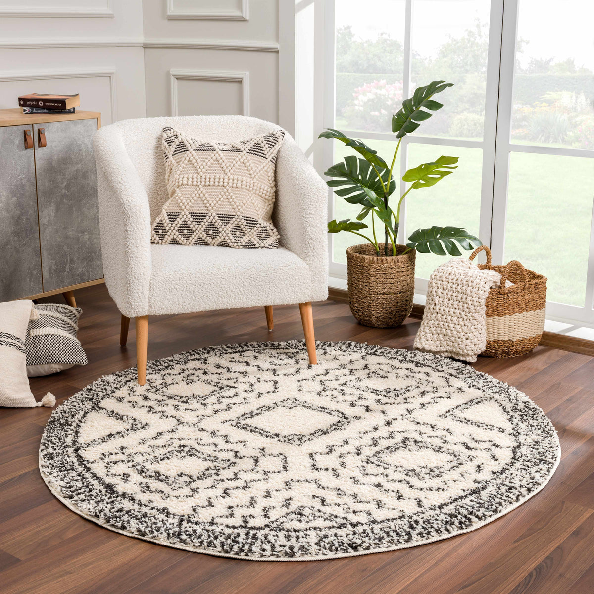 Buan Area Rug by Boutique Rugs, round cream shag with black geometric pattern on Tampa Home & Garden Store