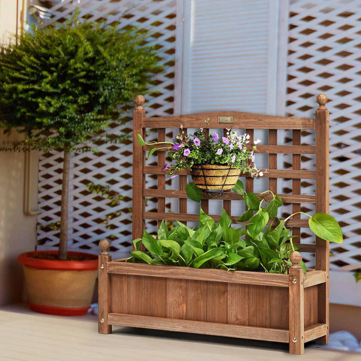 Wood planter box with lattice trellis; weather-resistant outdoor design with hanging basket on Tampa Home & Garden Store