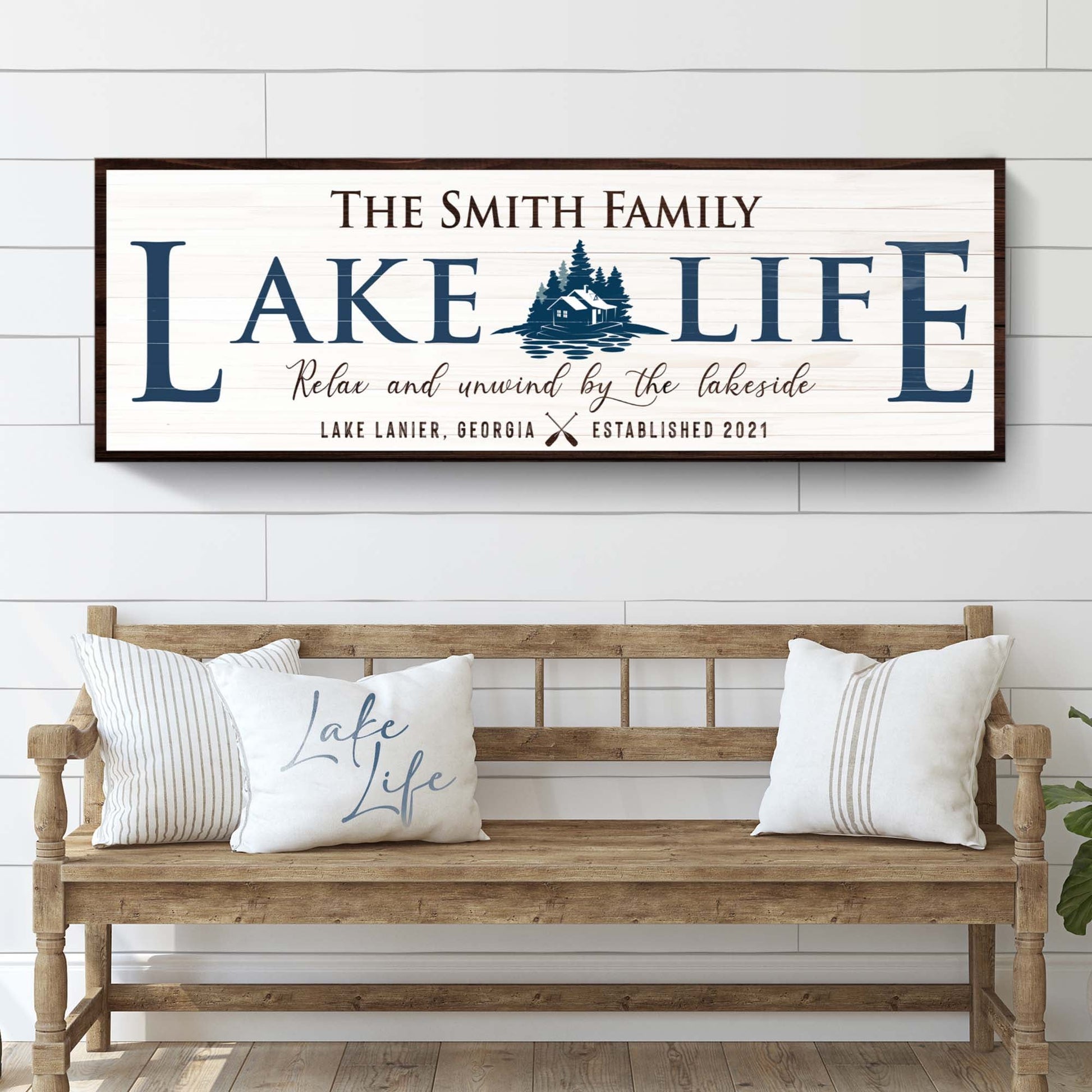 Personalized Lake Life Sign canvas with navy lettering and cabin graphic on wood frame on Tampa Home & Garden Store