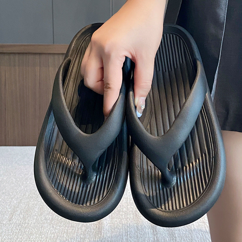 Stevvex women's black flip flops with grooved footbeds, lightweight casual sandals pair on Tampa Home & Garden Store