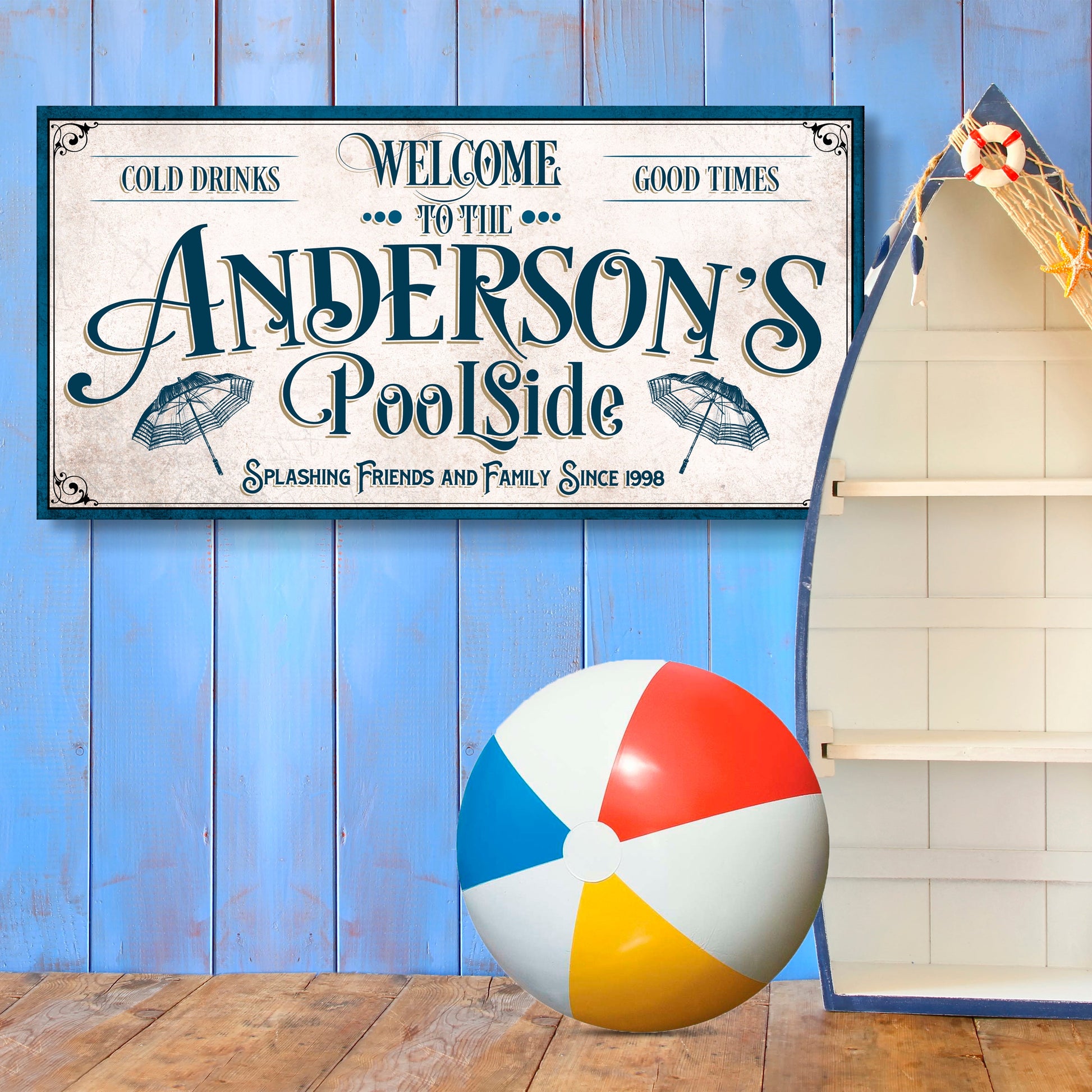 Canvas pool party sign Welcome to Anderson's Poolside on blue backdrop on Tampa Home & Garden Store