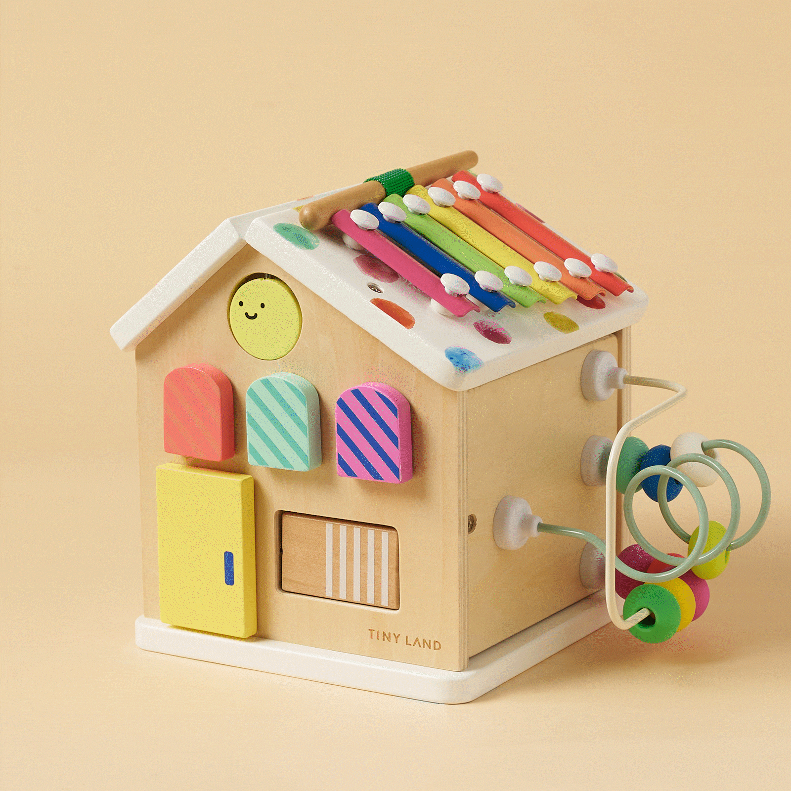 Tiny Land Cottage Activity Cube Rainbow from Tiny Land INC with rainbow roof xylophone beads on Tampa Home & Garden Store
