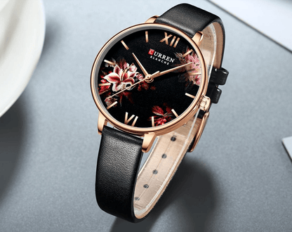Womens watch floral decoupage dial with large Roman numerals rose gold case black leather strap on Tampa Home & Garden Store