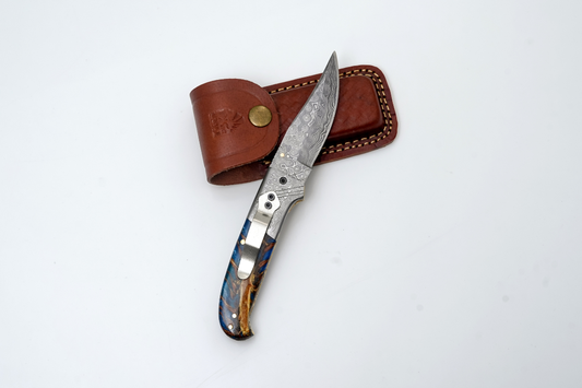 Damascus folding knife with blue resin burl handle, Titan K locking blade and leather sheath on Tampa Home & Garden Store