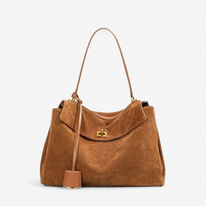 Large rectangular shoulder handbag in brown leather by Moktan Sabai with flap on Tampa Home & Garden Store