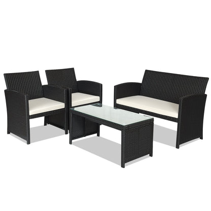 Juego de Muebles de Patio de Ratán de 4 Piezas con Cojines Resistentes al Clima y Mesa con Cubierta de Vidrio Templado-Azul Marino