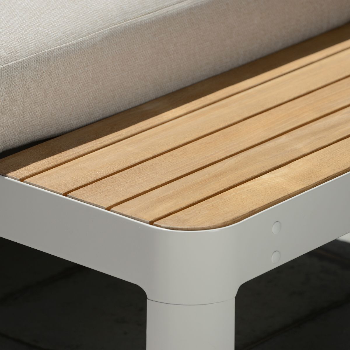 Portals Light C-Shape outdoor sofa with teak-like wooden slats on a white frame on Tampa Home & Garden Store