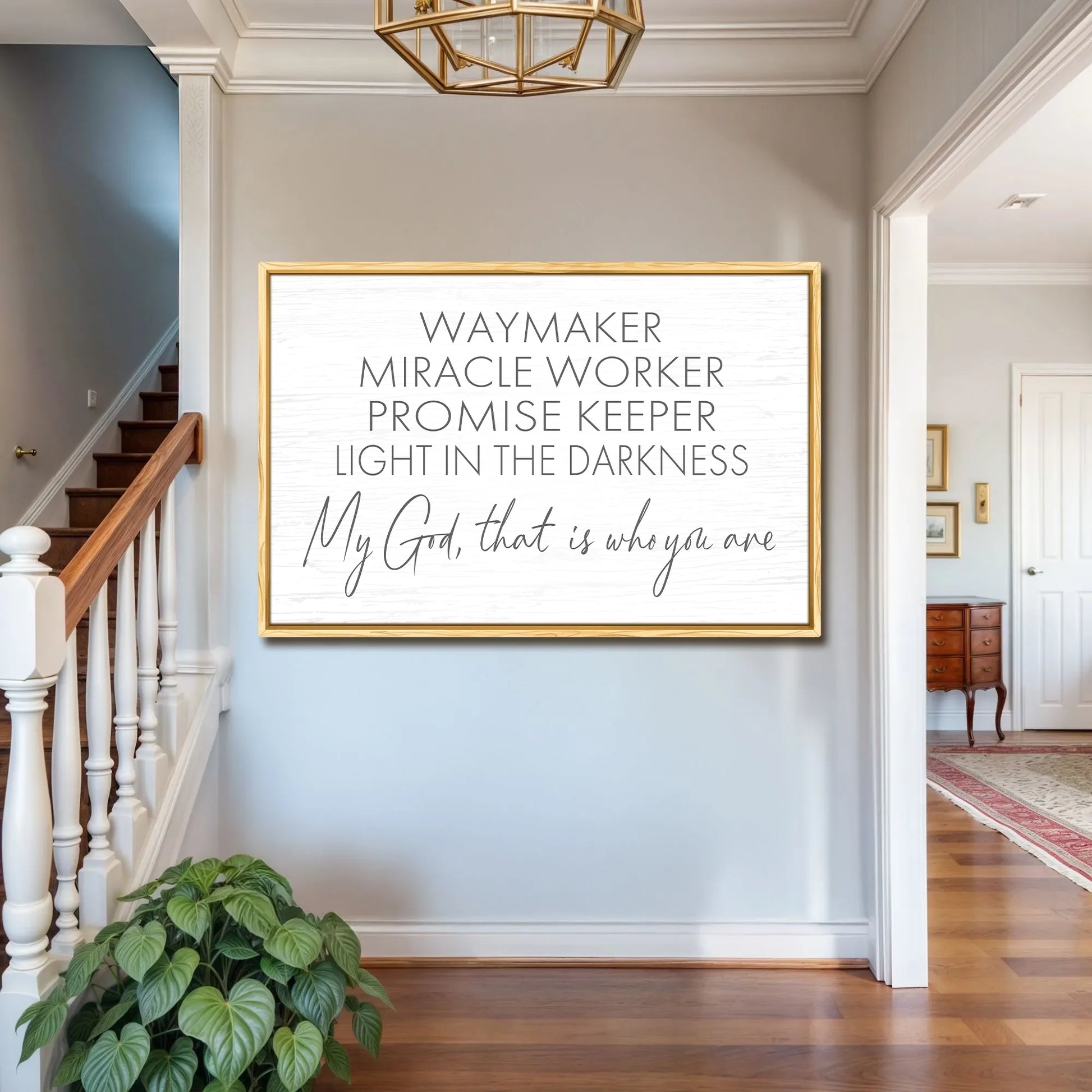 My God Way Maker Miracle Worker Faith Sign II canvas with a gold frame displayed in a foyer on Tampa Home & Garden Store