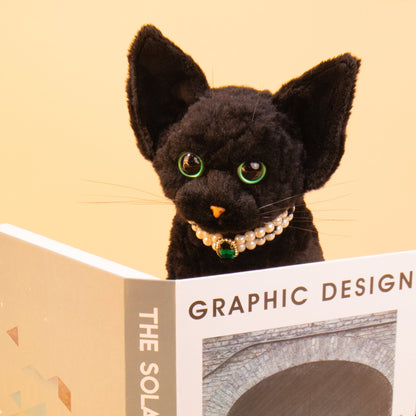 Devon Rex cat plush by Chongker, black fur with green eyes and pearl necklace pendant on Tampa Home & Garden Store