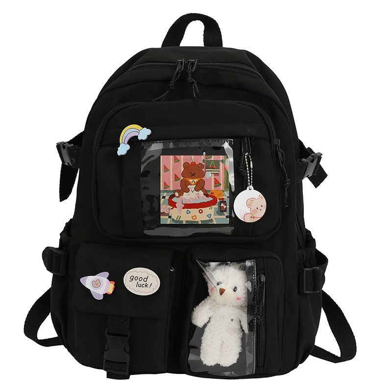 Dazzling mini backpack by Stevvex black with front clear pocket and plush bear in pocket on Tampa Home & Garden Store