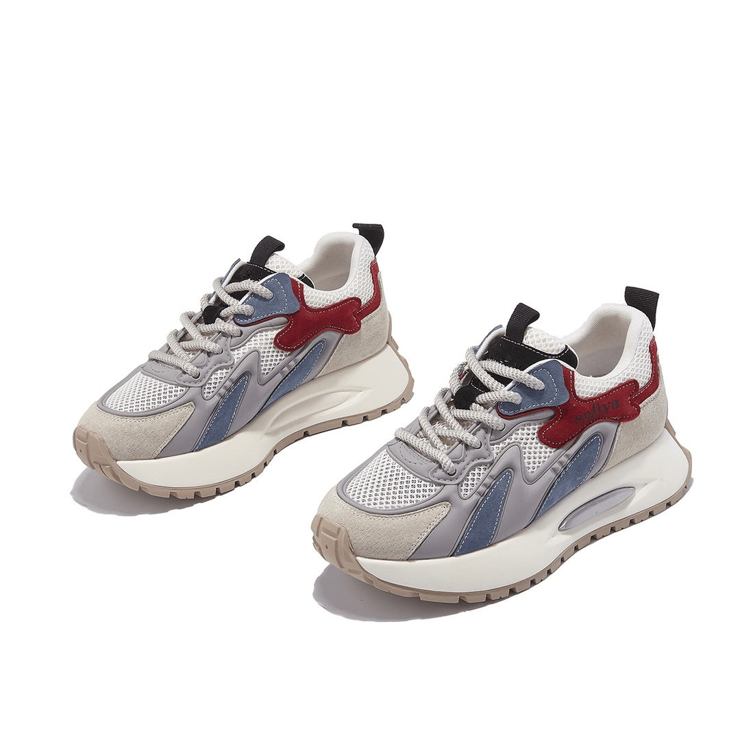 Pair of Stevvex women's sneakers with platform, white mesh upper and red suede accents on Tampa Home & Garden Store